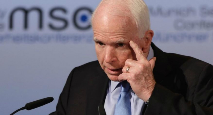 Why is it suddenly okay for Senator John McCain to talk negatively (attack) about a President while in a foreign country?